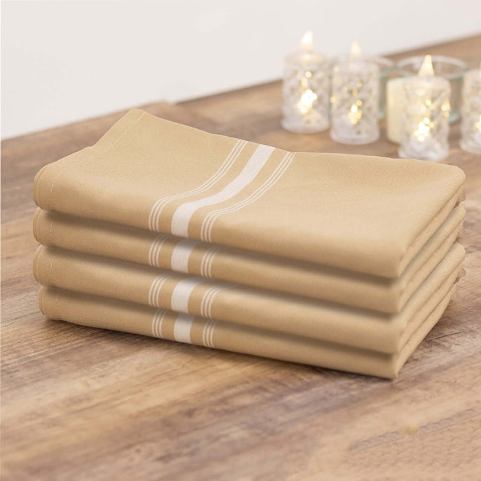 Set of four beige kitchen towels with white stripes.