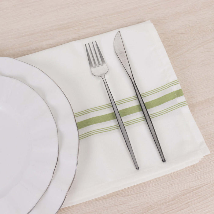 Elegant dining set with plate, fork, and knife on a linen napkin.