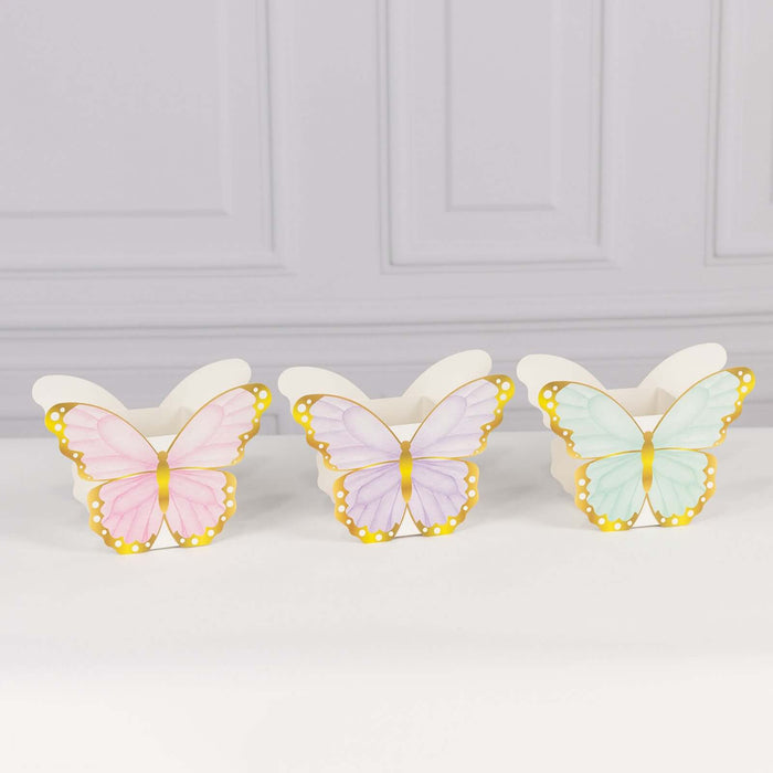 Colorful butterfly decor in pink, purple, and blue on a white background.