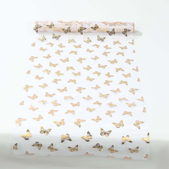 Butterfly-patterned wrapping paper roll on a plain background