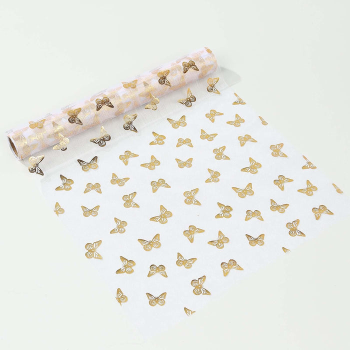 Butterfly print fabric roll with gold accents on a white background.
