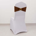 White chair cover with brown sash and decorative circle detail
