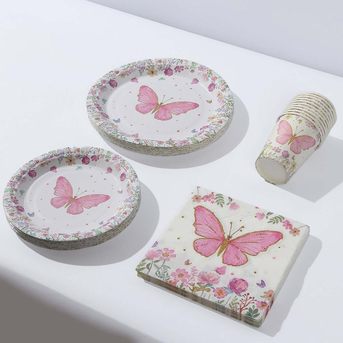Pink butterfly-themed disposable party plates and cups on a white background.