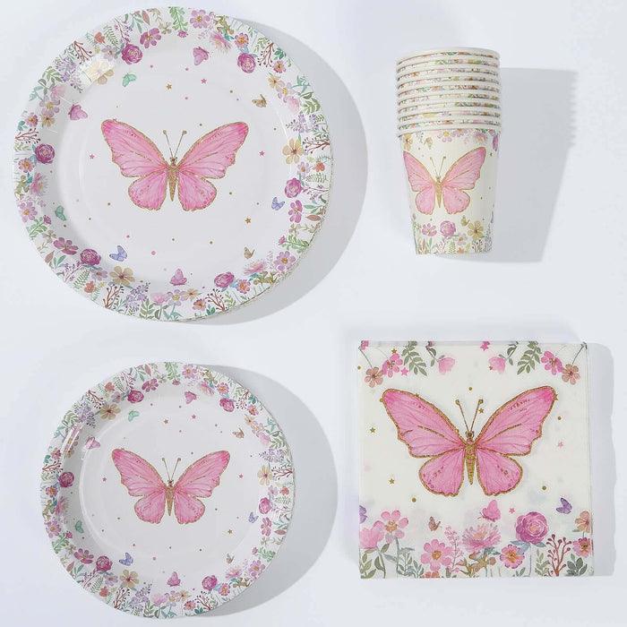 Pink butterfly-themed party plates, cups, and napkins on a white background.