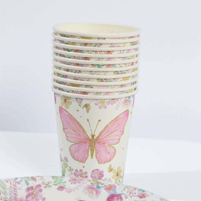 Stack of butterfly-themed paper cups on a white background