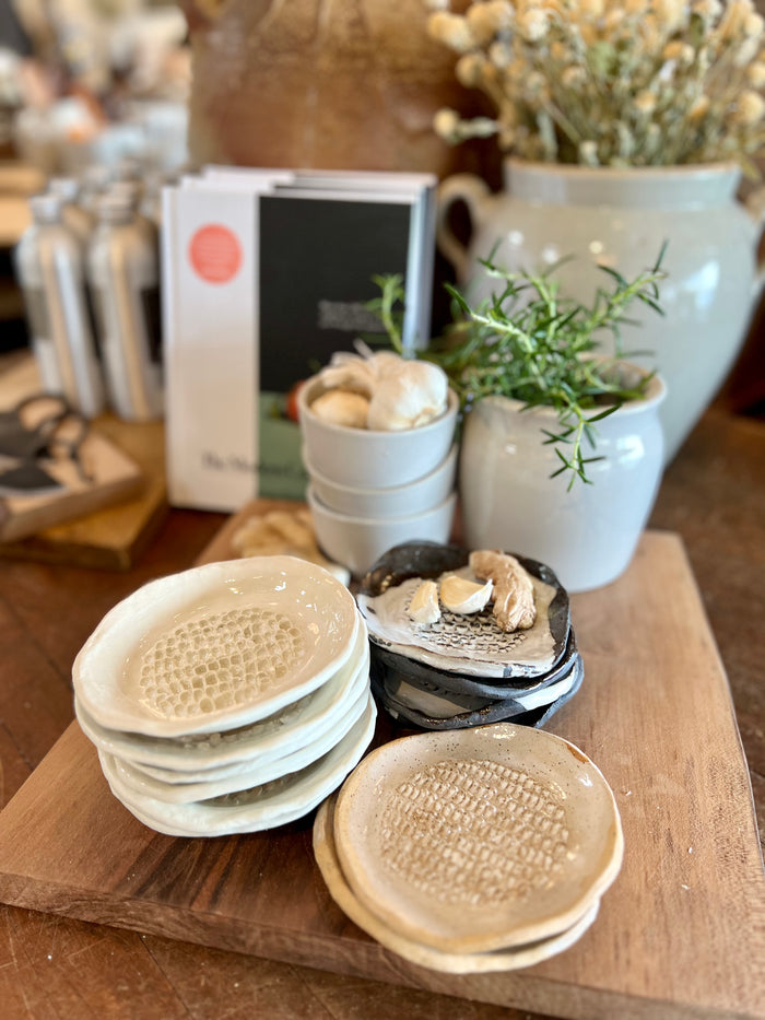 Ceramic grater set, stacked round discs with raised grating texture