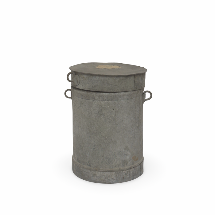 Grey metal canister with flat lid and side handles, weathered smooth surface