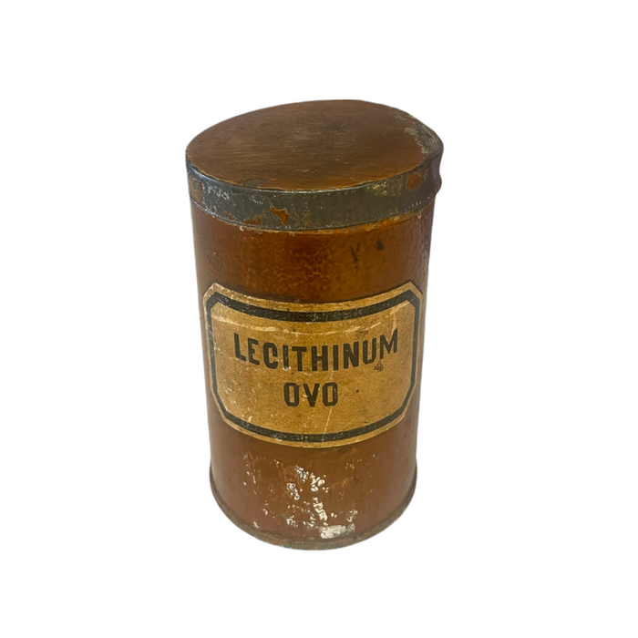 Small antique pharmacy canister with hinged lid and vintage label reading LECITHINUM OVO