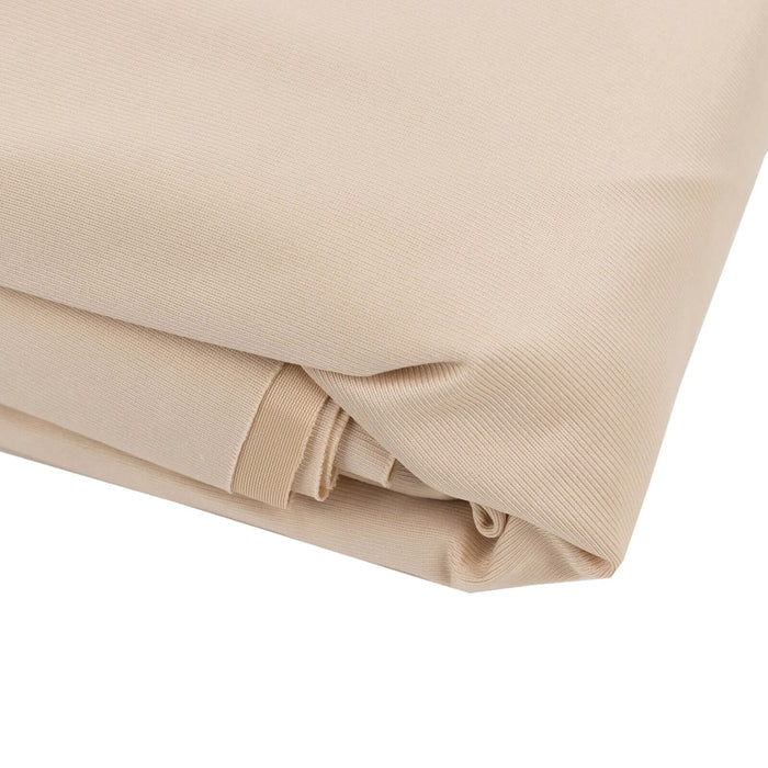 Beige fabric folded neatly for sewing or crafting projects.
