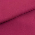 Textured magenta fabric showcasing fine ribbing details.