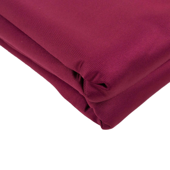 Burgundy folded fabric with a smooth texture for crafting or sewing projects.