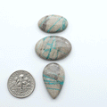 Carico Lake Turquoise cabochons with vibrant aqua-blue to turquoise tones and natural matrix, ideal for rings, pendants, and artisan jewelry.