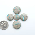 Carico Lake Turquoise cabochons with vibrant aqua-blue to turquoise tones and natural matrix, ideal for rings, pendants, and artisan jewelry.