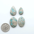 Carico Lake Turquoise cabochons with vibrant aqua-blue to turquoise tones and natural matrix, ideal for rings, pendants, and artisan jewelry.