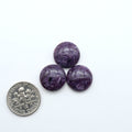 Shop natural Charoite cabochons with vivid violet swirls, perfect for jewelry makers and silversmiths creating rings, pendants, and custom designs.