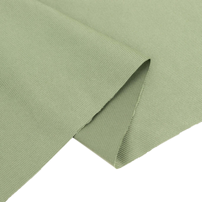Textured green fabric swatch on a white background