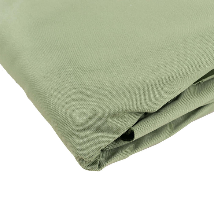 Folded green fabric swatch on a plain background.