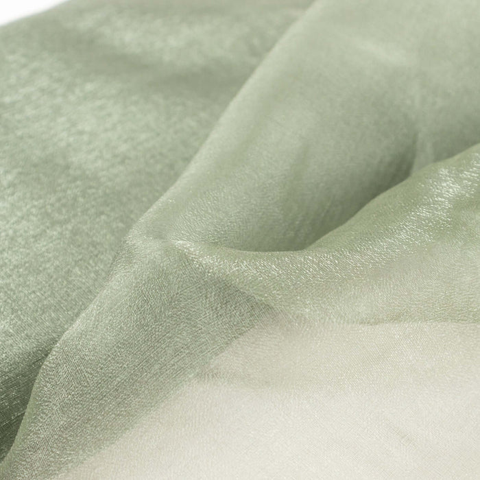 Soft green sheer fabric with a delicate texture.