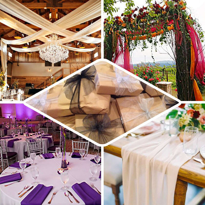 Decorative wedding setup with tables, floral arch, and gift boxes in a rustic venue.