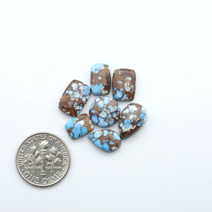 Discover the beauty of Natural Golden Hills Turquoise—prized for its icy blue tones, golden matrix, and exceptional quality. Ideal for artisan jewelry designs.