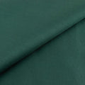 Green textured fabric with subtle ribbing detail.