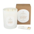 White scented candle with twin wicks, round label, kraft gift box, and matchbox