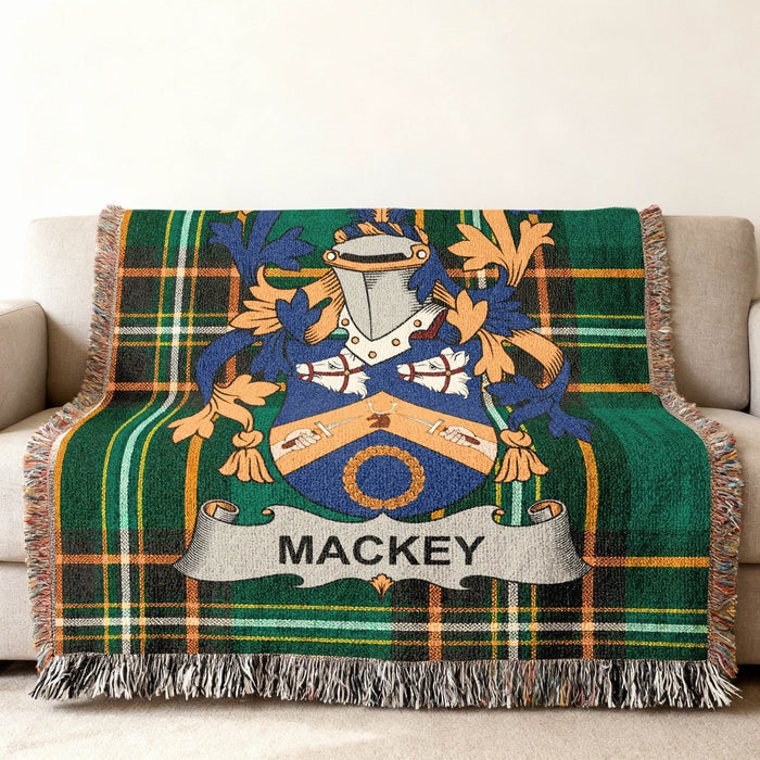 Close view of the Mackey family crest woven into Irish National Tartan cotton fabric.