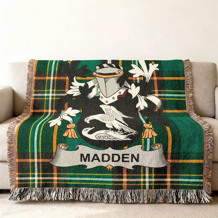 Close view of the Madden family crest woven into Irish National Tartan cotton fabric.