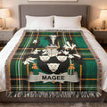 Magee family crest Irish National Tartan woven blanket displayed on a bed.