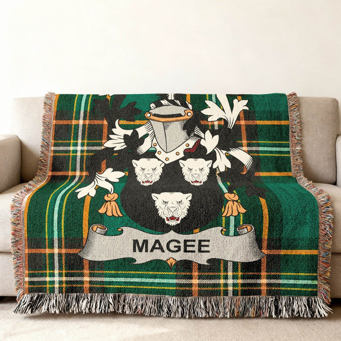 Close view of the Magee family crest woven into Irish National Tartan cotton fabric.