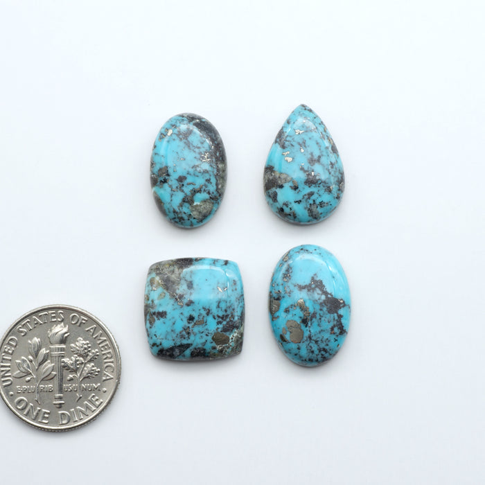 Nacozari turquoise cabochons are striking gemstones known for their vibrant blue to greenish-blue colors often with, unique b