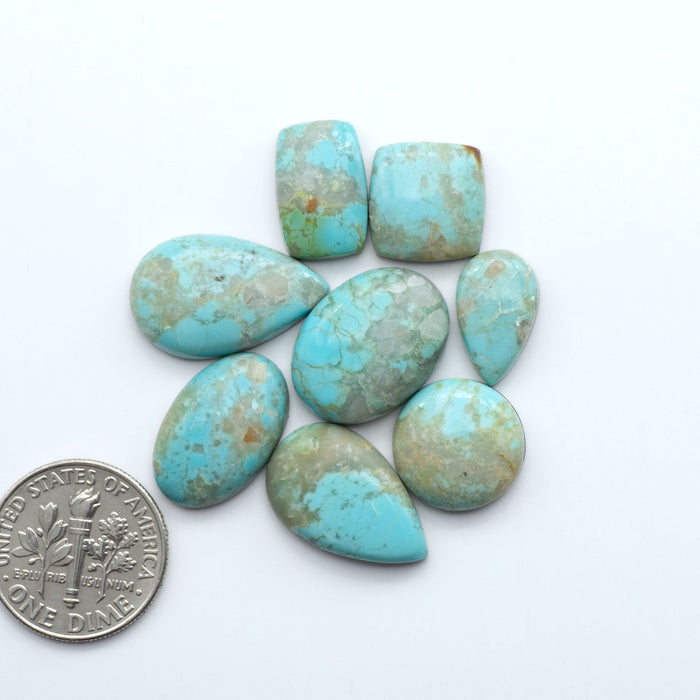 Add a touch of beauty to your collection with our stunning Pilot Mountain Turquoise Cabochons. Perfect for jewelry making each piece is truly one-of-a-kind.