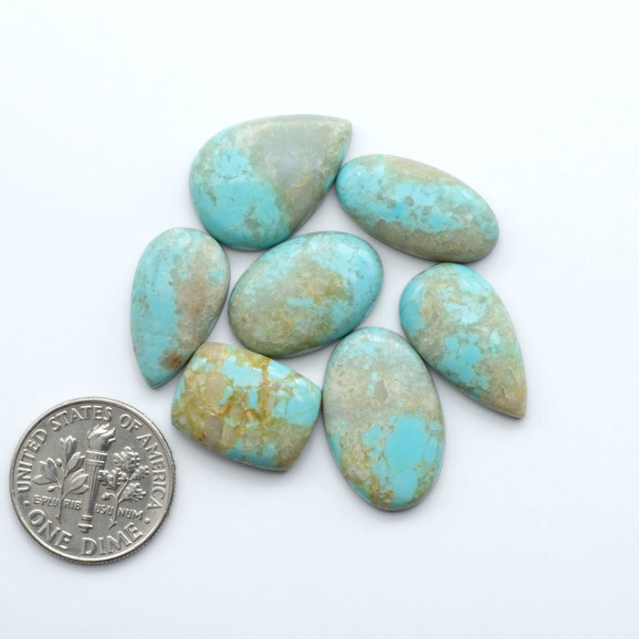 Add a touch of beauty to your collection with our stunning Pilot Mountain Turquoise Cabochons. Perfect for jewelry making each piece is truly one-of-a-kind.