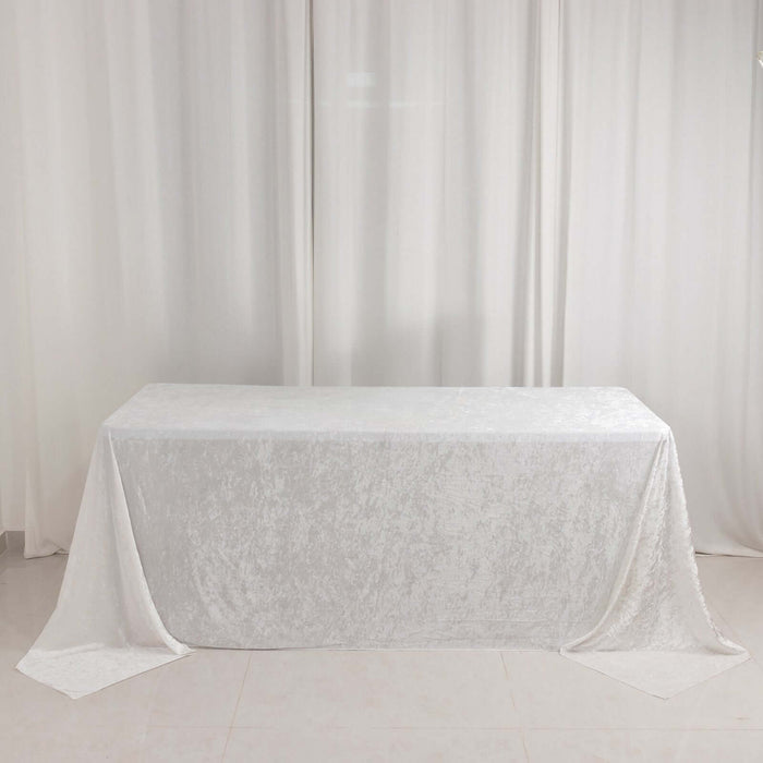 White tablecloth draped over a table against a light background.