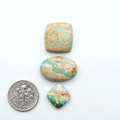 Royston Turquoise cabochons are famous for their distinctive matrix and unique green and blue hues, making them a favored option among jewelry designers.
