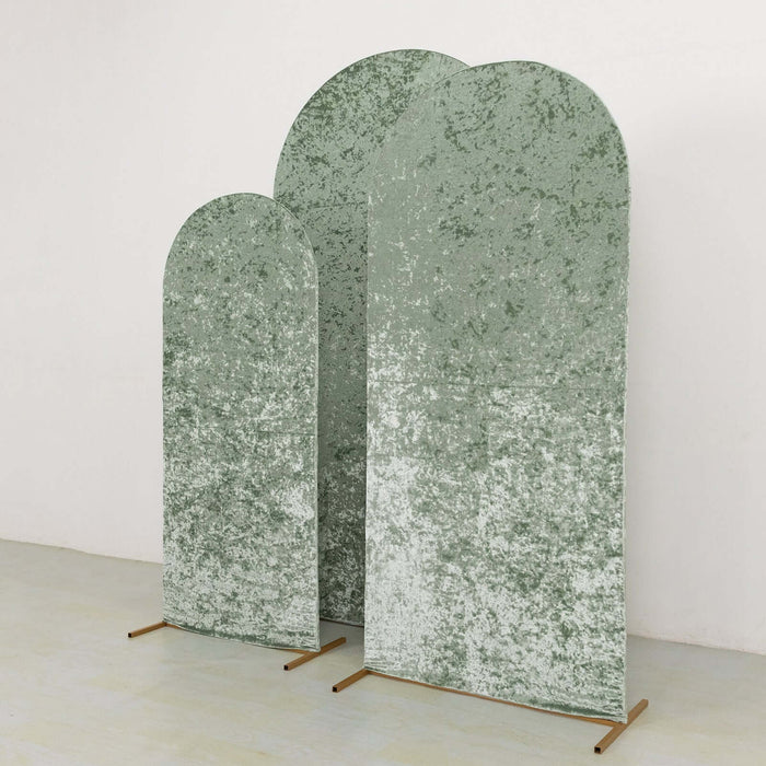 Textured green arch panels in varying heights on a plain backdrop.