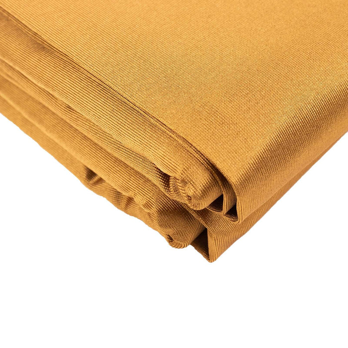 Folded mustard yellow fabric swatch on a white background.