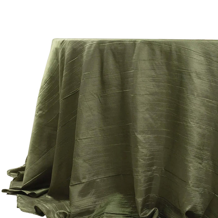 Olive green tablecloth draped elegantly on a table