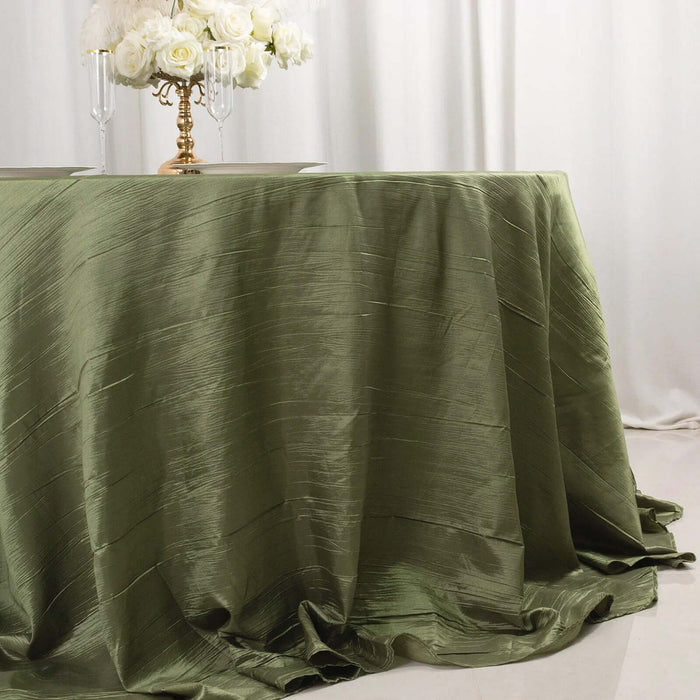 Olive green satin tablecloth draped elegantly on a table