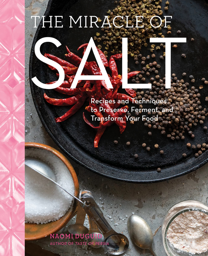 Salt cookbook book cover with chili peppers, salt bowl, and title text.