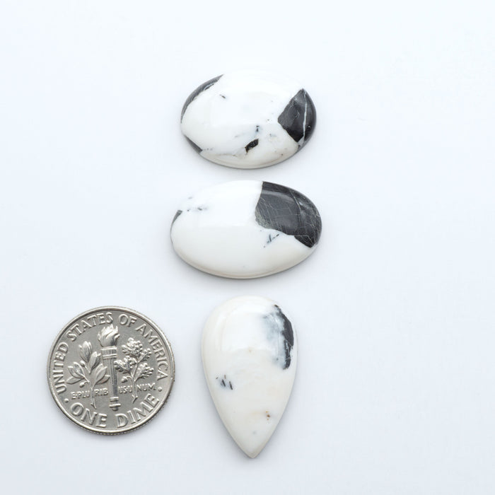 Natural White Buffalo Stone Cabochons are semi-precious gemstones cut into shapes ideal for jewelry-making, making them an excellent choice for artisans.