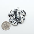 Natural White Buffalo Stone Cabochons are semi-precious gemstones cut into shapes ideal for jewelry-making, making them an excellent choice for artisans.