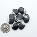 Natural White Buffalo Stone Cabochons are semi-precious gemstones cut into shapes ideal for jewelry-making, making them an excellent choice for artisans.