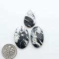 Natural White Buffalo Stone Cabochons are semi-precious gemstones cut into shapes ideal for jewelry-making, making them an excellent choice for artisans.