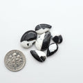 Natural White Buffalo Stone Cabochons are semi-precious gemstones cut into shapes ideal for jewelry-making, making them an excellent choice for artisans.