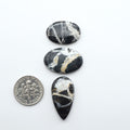 Natural White Buffalo Stone Cabochons are semi-precious gemstones cut into shapes ideal for jewelry-making, making them an excellent choice for artisans.